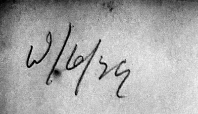 The same pencil mark with the contrast increased, showing a w, a 6 between two slashes and two unread characters